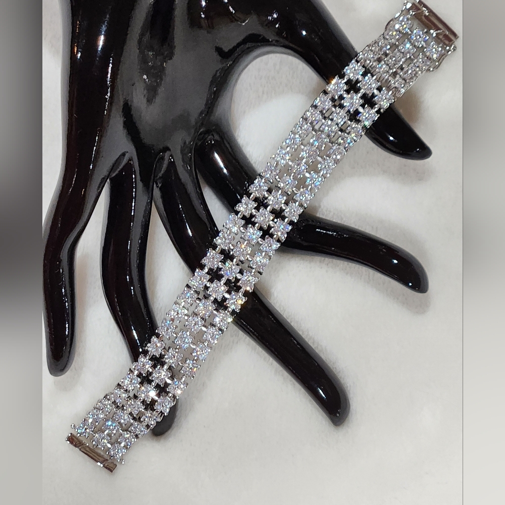 Luxurious Silver Multi-Strand Bracelet with Clear Gemstone